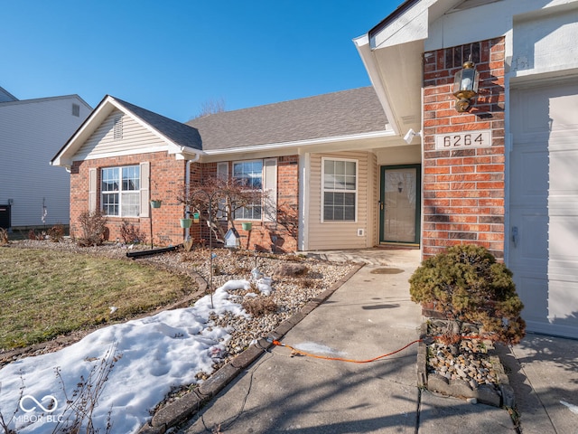 6264 Whitaker Farms Dr, Indianapolis, IN 46237 - property entrance featuring a garage