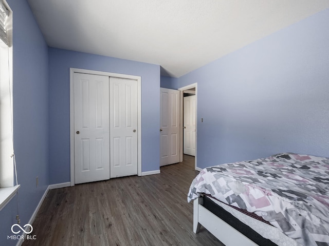 6264 Whitaker Farms Dr, Indianapolis, IN 46237 - bedroom with dark hardwood / wood-style floors and a closet