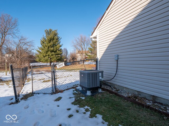 6264 Whitaker Farms Dr, Indianapolis, IN 46237 - yard covered in snow with cooling unit
