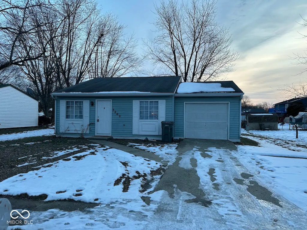 view of front of house with a garage