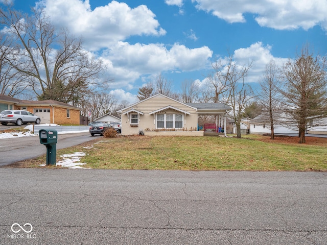 ranch-style house with a front lawn and a carport