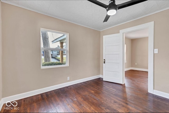 spare room with ceiling fan, crown molding, and dark hardwood / wood-style flooring