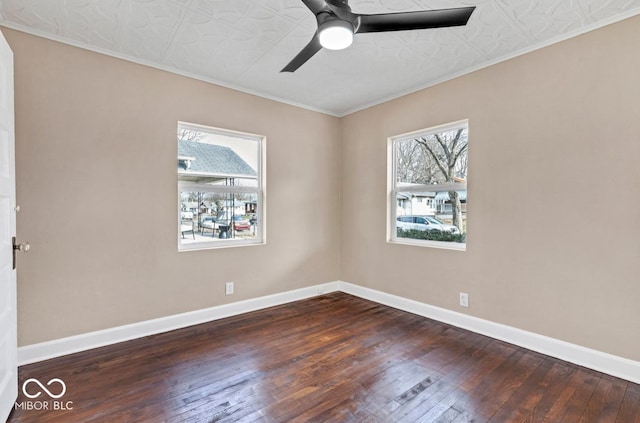 unfurnished room featuring ornamental molding, dark hardwood / wood-style floors, and ceiling fan