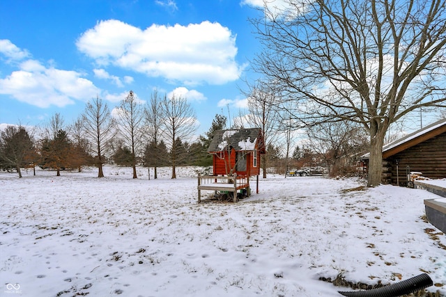 view of yard covered in snow