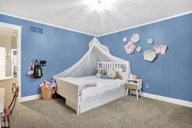 bedroom with ornamental molding, carpet, and a textured ceiling