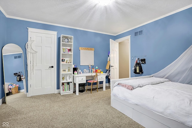 bedroom with crown molding, carpet floors, and a textured ceiling