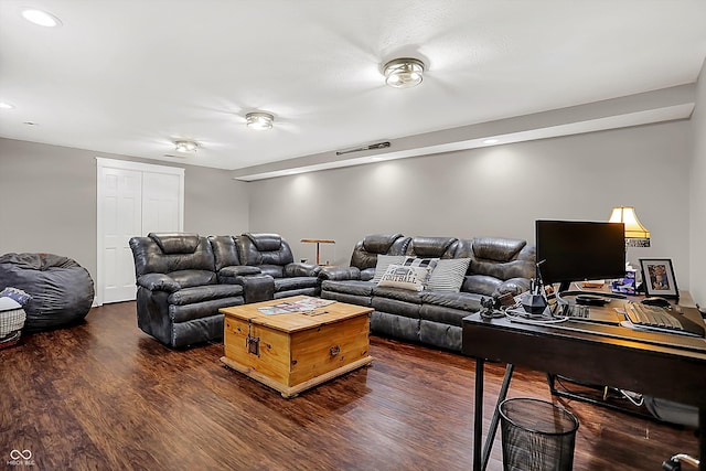 living room featuring dark wood-type flooring