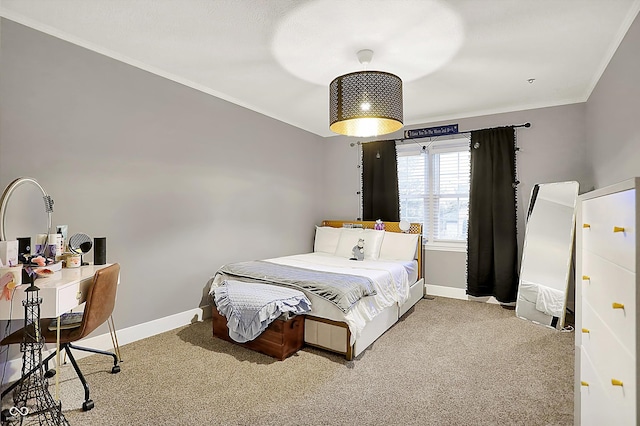 bedroom featuring ornamental molding and carpet floors