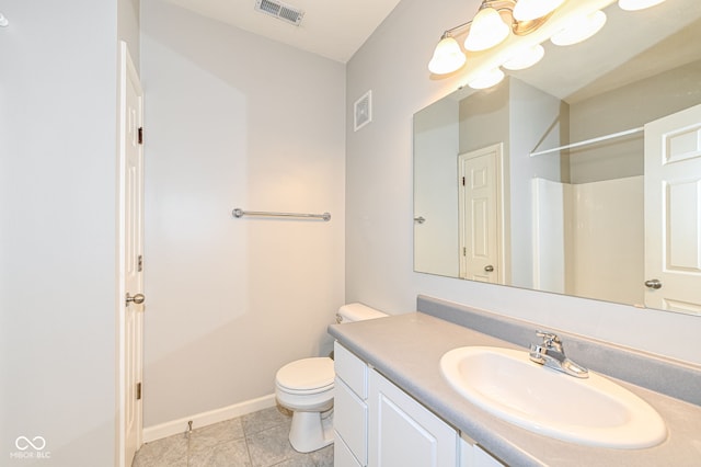 bathroom with walk in shower, tile patterned floors, toilet, and vanity