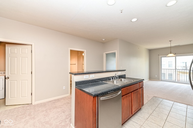 kitchen featuring sink, light carpet, dishwasher, pendant lighting, and a kitchen island with sink