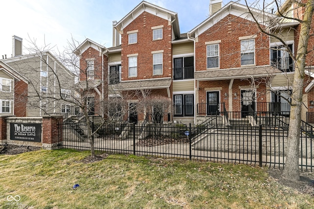 view of front of property with a front lawn