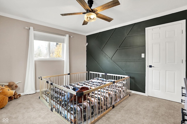 bedroom with ornamental molding, light carpet, and ceiling fan