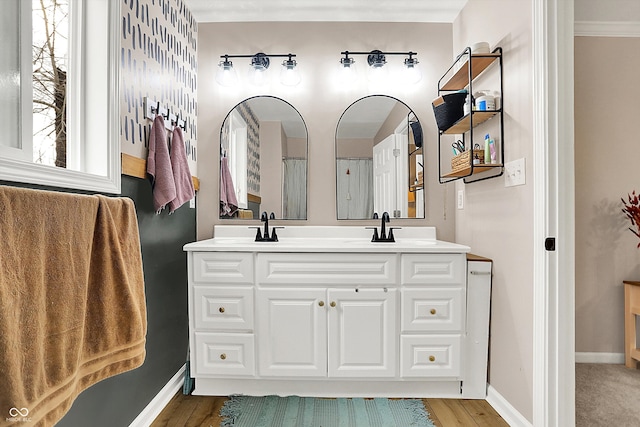 bathroom featuring vanity and hardwood / wood-style floors