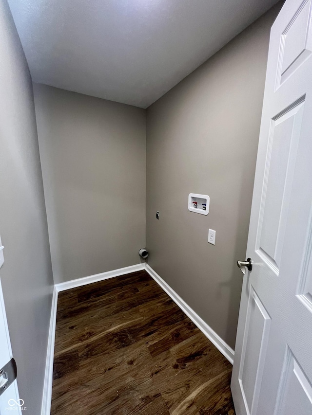 laundry area featuring dark hardwood / wood-style flooring, hookup for a washing machine, and electric dryer hookup