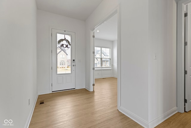 foyer entrance featuring light wood-type flooring