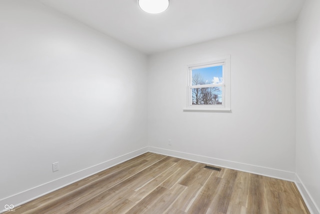 empty room with light wood-type flooring