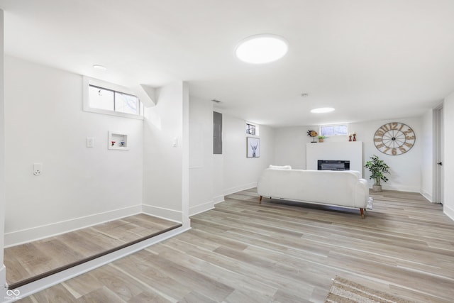 unfurnished living room with light hardwood / wood-style flooring