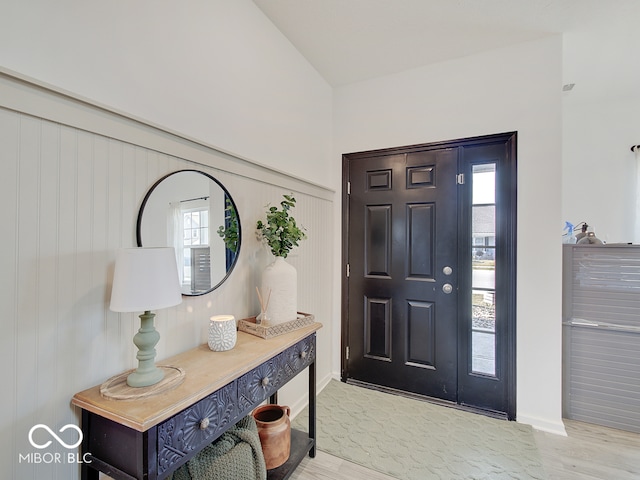 foyer entrance with light wood-type flooring