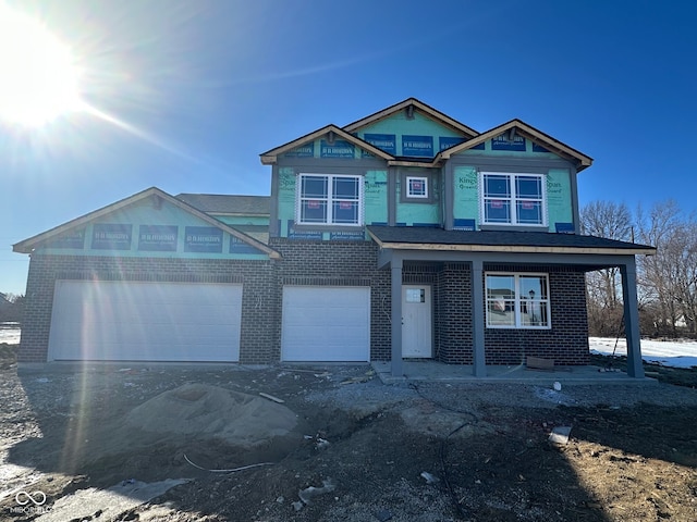 view of front of house with a garage