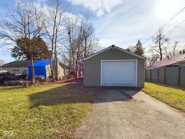 garage with a yard