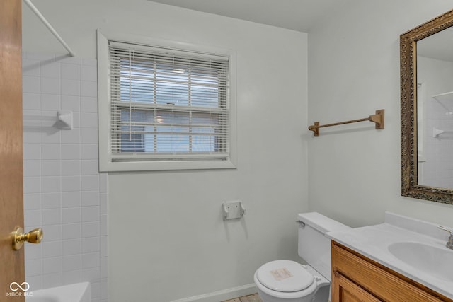 full bathroom featuring vanity, tub / shower combination, and toilet