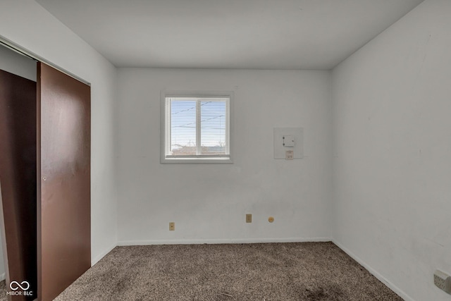 unfurnished bedroom featuring a closet and carpet