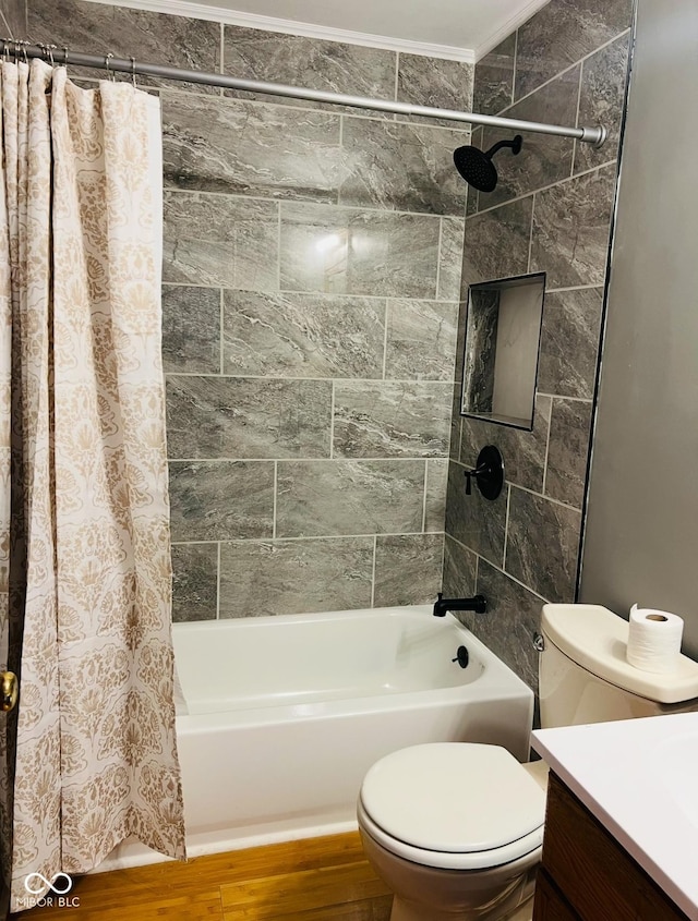 full bathroom with shower / tub combo, vanity, wood-type flooring, and toilet