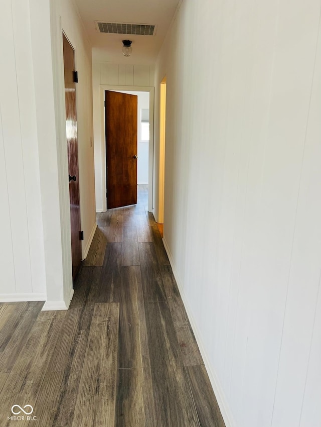 hall featuring dark wood-type flooring