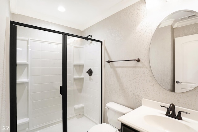 full bath featuring toilet, a shower stall, and vanity