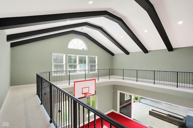 hallway featuring high vaulted ceiling, carpet, beam ceiling, and baseboards