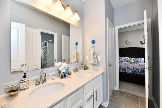 bathroom featuring vanity and tile patterned flooring