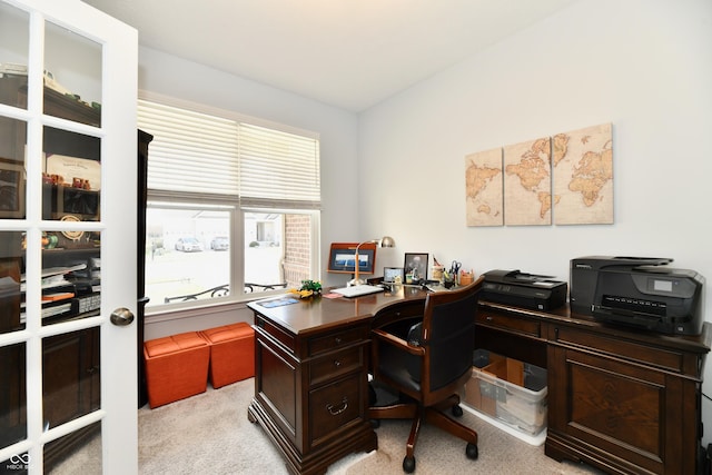 carpeted office space with lofted ceiling