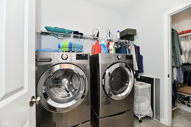 washroom featuring separate washer and dryer