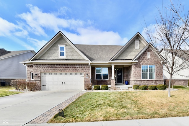 craftsman-style house featuring a garage and a front yard