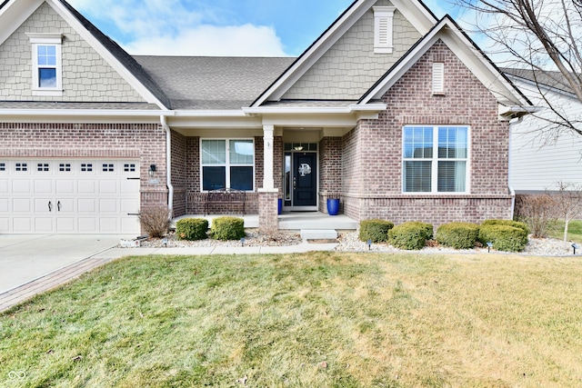 craftsman-style home featuring a garage and a front yard