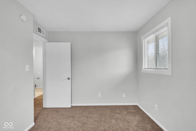 view of carpeted spare room