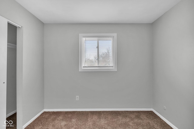 empty room with carpet flooring