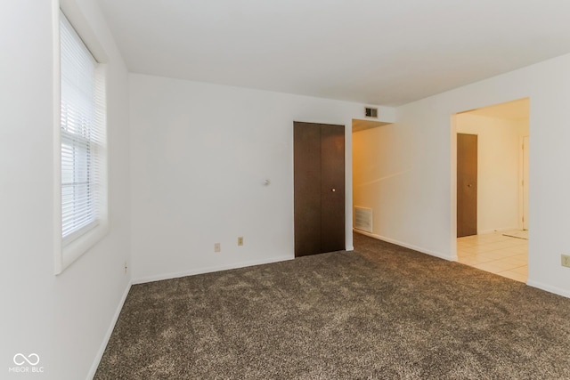 view of carpeted spare room