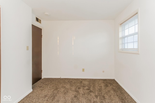 view of carpeted spare room