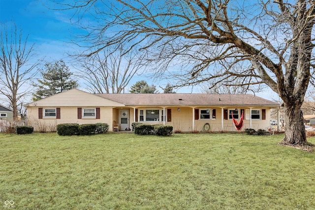 ranch-style house with a front yard