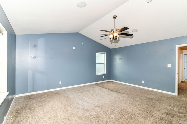 1324 Trailside Dr, Greenwood, IN 46143 - carpeted empty room featuring lofted ceiling, a ceiling fan, and baseboards