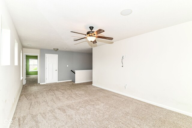 1324 Trailside Dr, Greenwood, IN 46143 - carpeted empty room with a ceiling fan and baseboards