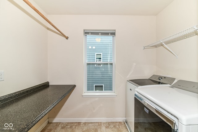 1324 Trailside Dr, Greenwood, IN 46143 - laundry area featuring washing machine and clothes dryer and baseboards