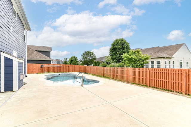 1324 Trailside Dr, Greenwood, IN 46143 - view of swimming pool featuring a fenced backyard, a patio area, and a hot tub