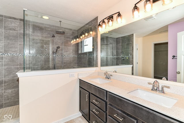 1324 Trailside Dr, Greenwood, IN 46143 - bathroom with walk in shower, double vanity, and a walk in closet