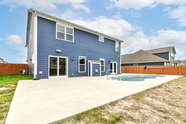 1324 Trailside Dr, Greenwood, IN 46143 - back of house with a fenced backyard, a patio, and cooling unit