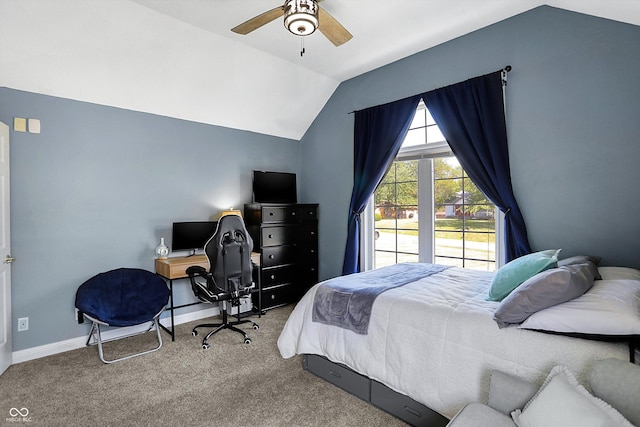 carpeted bedroom with ceiling fan and lofted ceiling