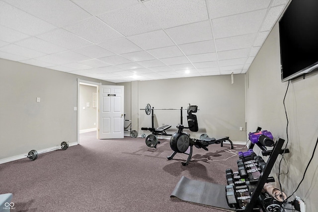 exercise room with a drop ceiling