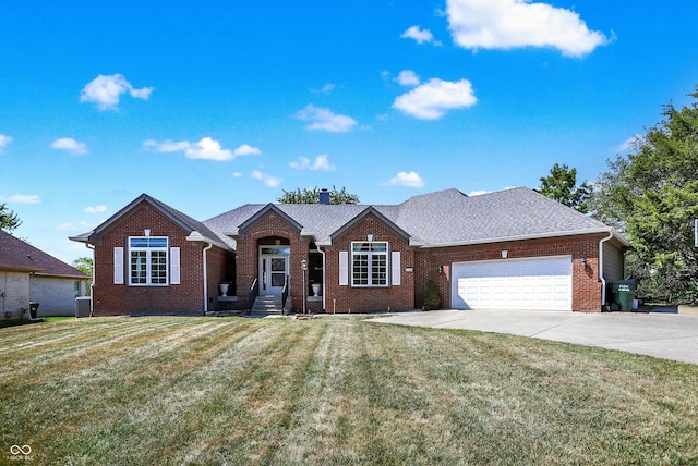 ranch-style home featuring a garage, central AC, and a front lawn