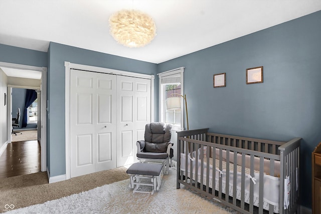 bedroom featuring a closet and carpet